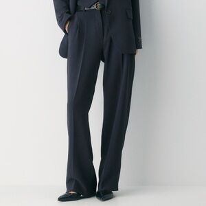 Aritzia Effortless Re(Essential) pants in navy blue.